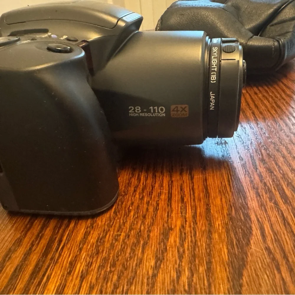 Olympus Black Compact Digital Camera with 28-115mm Lens